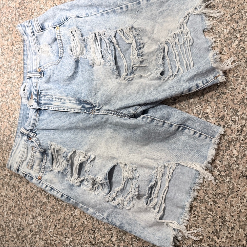 Distressed Light Blue Denim Boyfriend capris